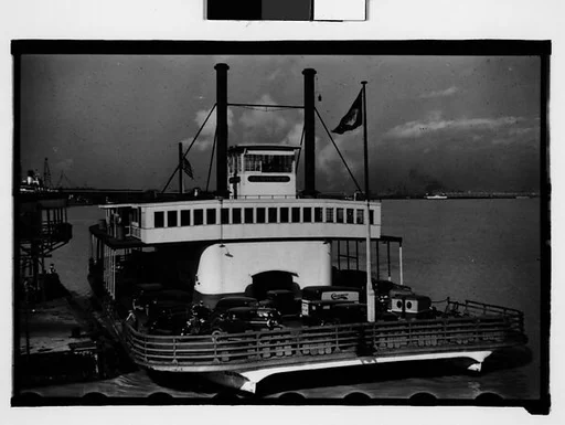 [Ferryboat "Algiers" at Dock with Parked Cars on Deck, New Orleans, Louisiana]