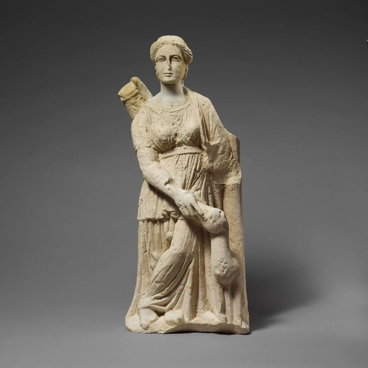 Limestone statuette of Artemis with a fawn — Unknown
