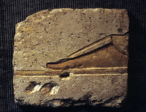 Relief with a royal foot