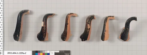Terracotta fragments of kylikes (drinking cups)