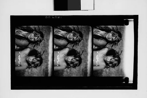 [South Seas: Three Motion Picture Film Frames of Young Couple]