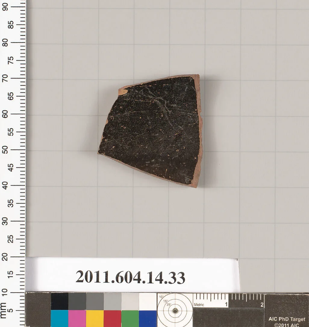 Terracotta fragment of a kylix (drinking cup)? — Unknown