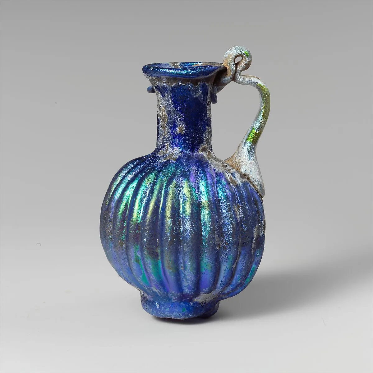 Glass juglet with vertical ribbing — Unknown