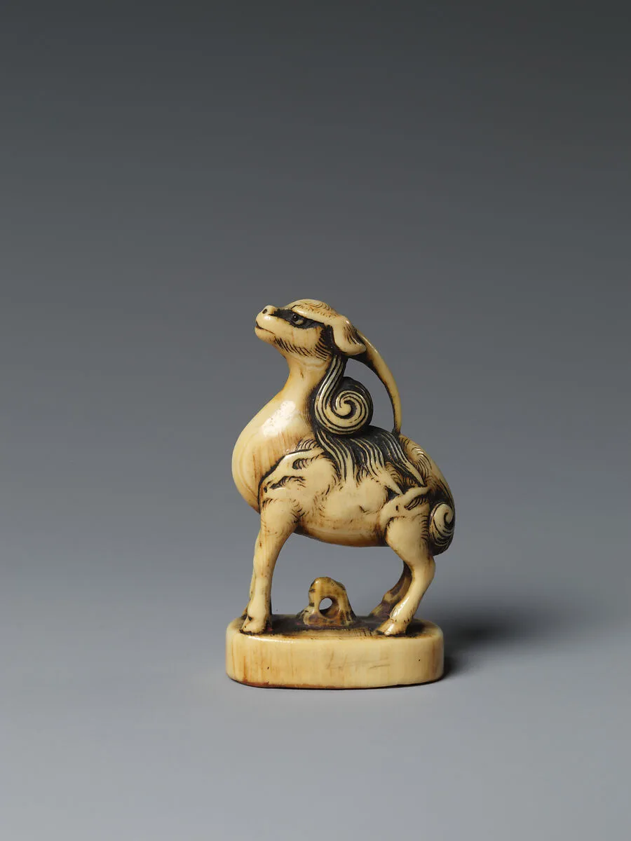 麒麟判子牙彫根付|Kirin (Mythical Chimera) Standing on a Seal — Unknown