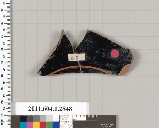 Terracotta fragment of a kylix (drinking cup)