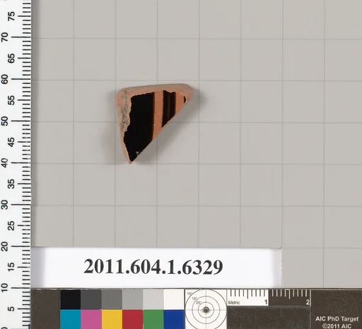 Terracotta fragment of a kylix (drinking cup)