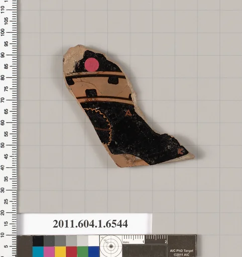 Terracotta fragment of a kylix (drinking cup)