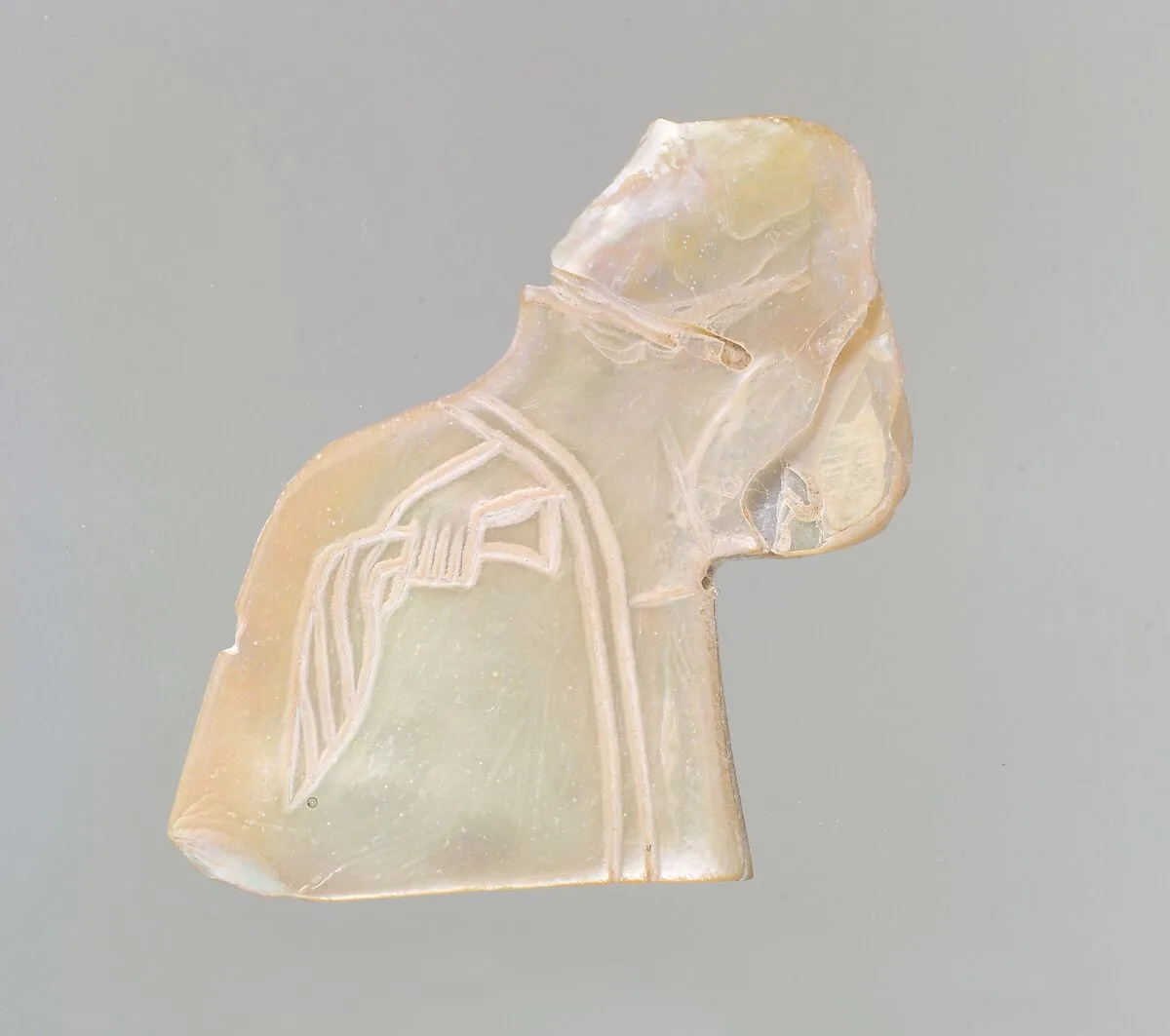 Inlay: banquet scene with a seated figure holding a palm frond — Unknown