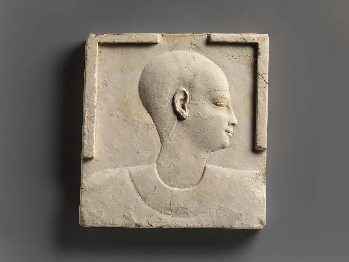 Plaque with head and shoulders of a priestly figure, opposite side head of priestly figure and most of a figure of crocodile-headed god — Unknown