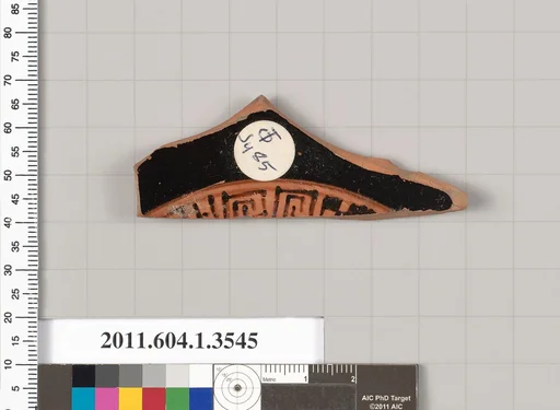 Terracotta fragment of a kylix (drinking cup)