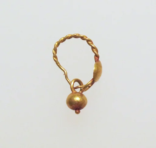 Gold earring with disc and pendant