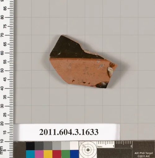 Terracotta fragment of a kylix: Band cup (drinking cup)