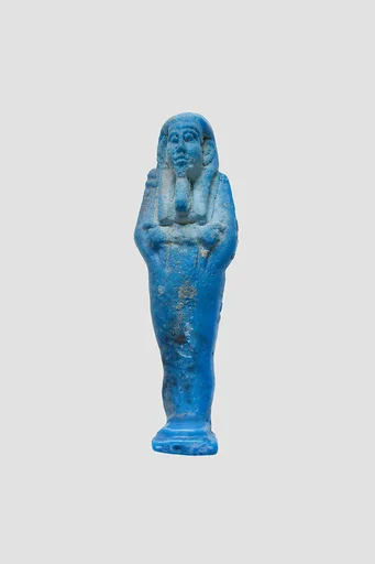 Uninscribed shabti from tomb of Nespekashuty
