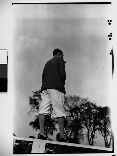 [Spectator Standing on Wooden Fence, Darien, Connecticut]
