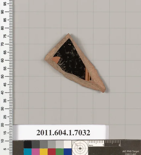 Terracotta fragment of a kylix (drinking cup)