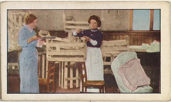 Card No. 127, Converting Banana Boxes Into Babies Cradles, from the World War I Scenes series (T121) issued by Sweet Caporal Cigarettes — Underwood & Underwood|American Tobacco Company