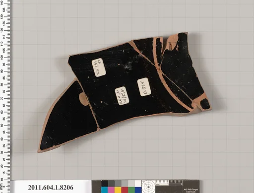 Terracotta fragment of a kylix (drinking cup)