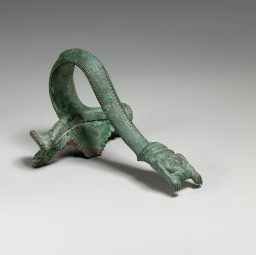 Bronze handle of an oinochoe (jug)
