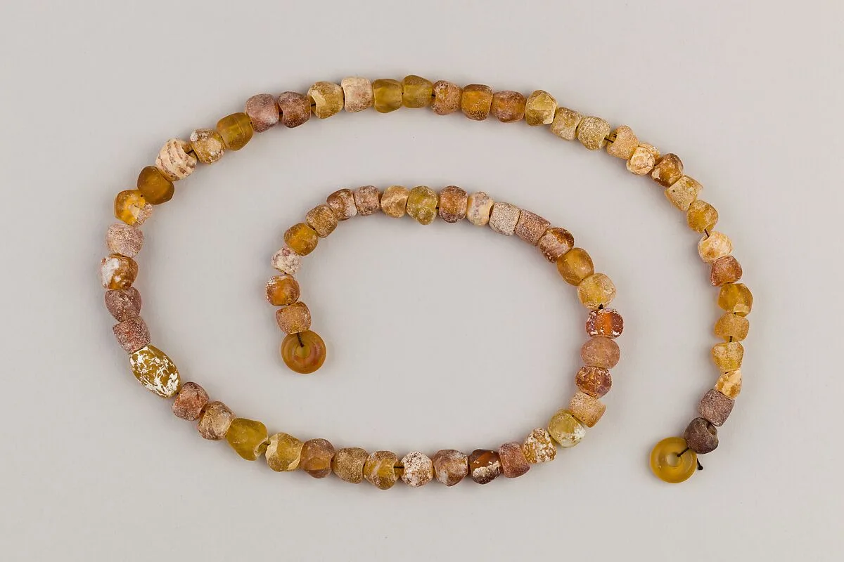 String of 70 beads — Unknown