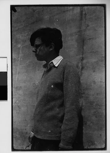 [Woman in Sweater and Horn-Rimmed Glasses]