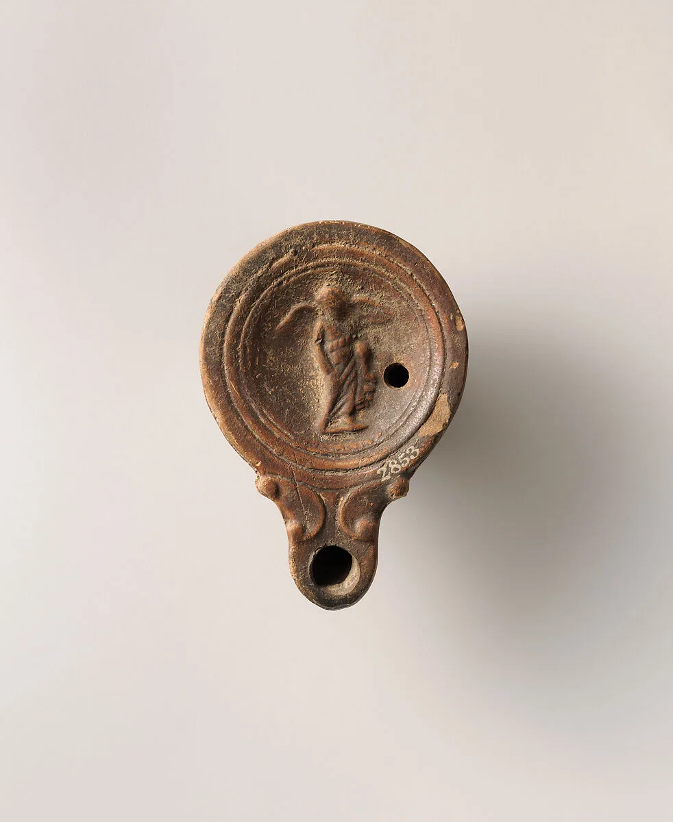 Terracotta oil lamp — Unknown