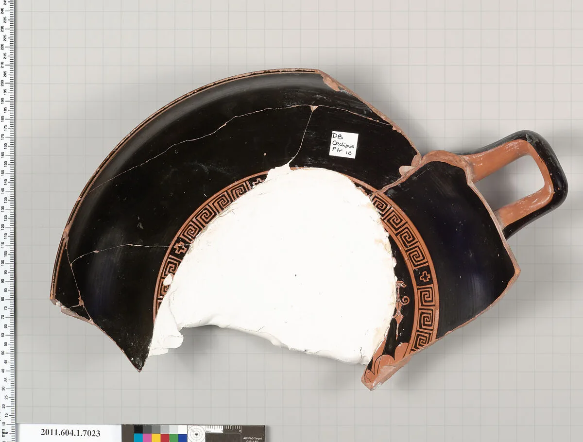 Terracotta fragment of a kylix (drinking cup) — Oedipus Painter