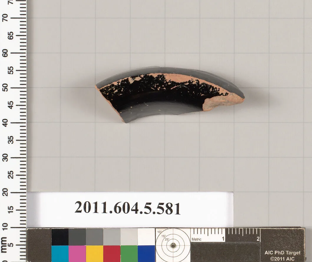 Terracotta fragment of a stemless kylix (drinking cup)? — Unknown