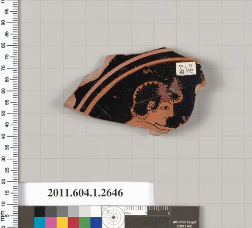 Terracotta fragment of a kylix (drinking cup)