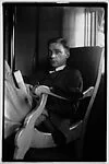[Walker Evans Seated in Armchair]