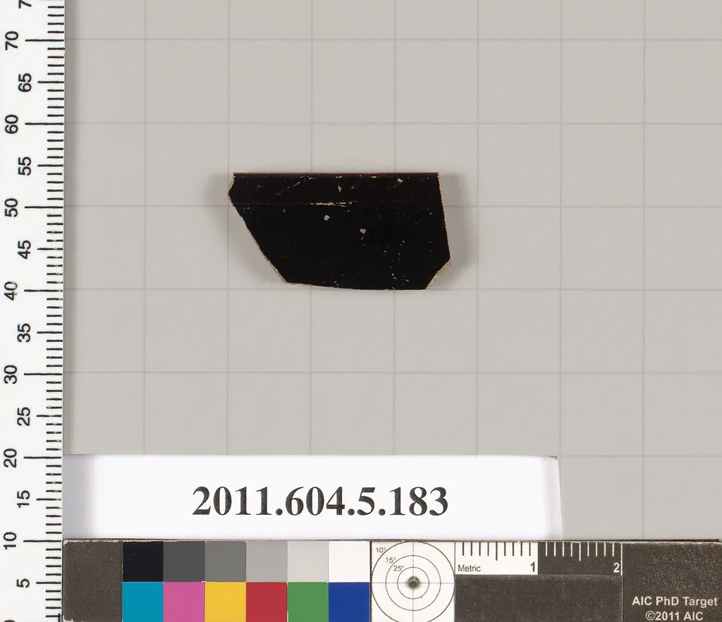 Terracotta rim fragment of a kylix (drinking cup)? — Unknown