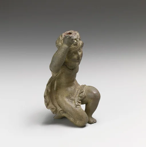 Bronze statuette of Eros kneeling
