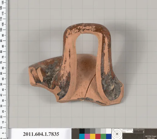Terracotta fragment of a kylix (drinking cup)