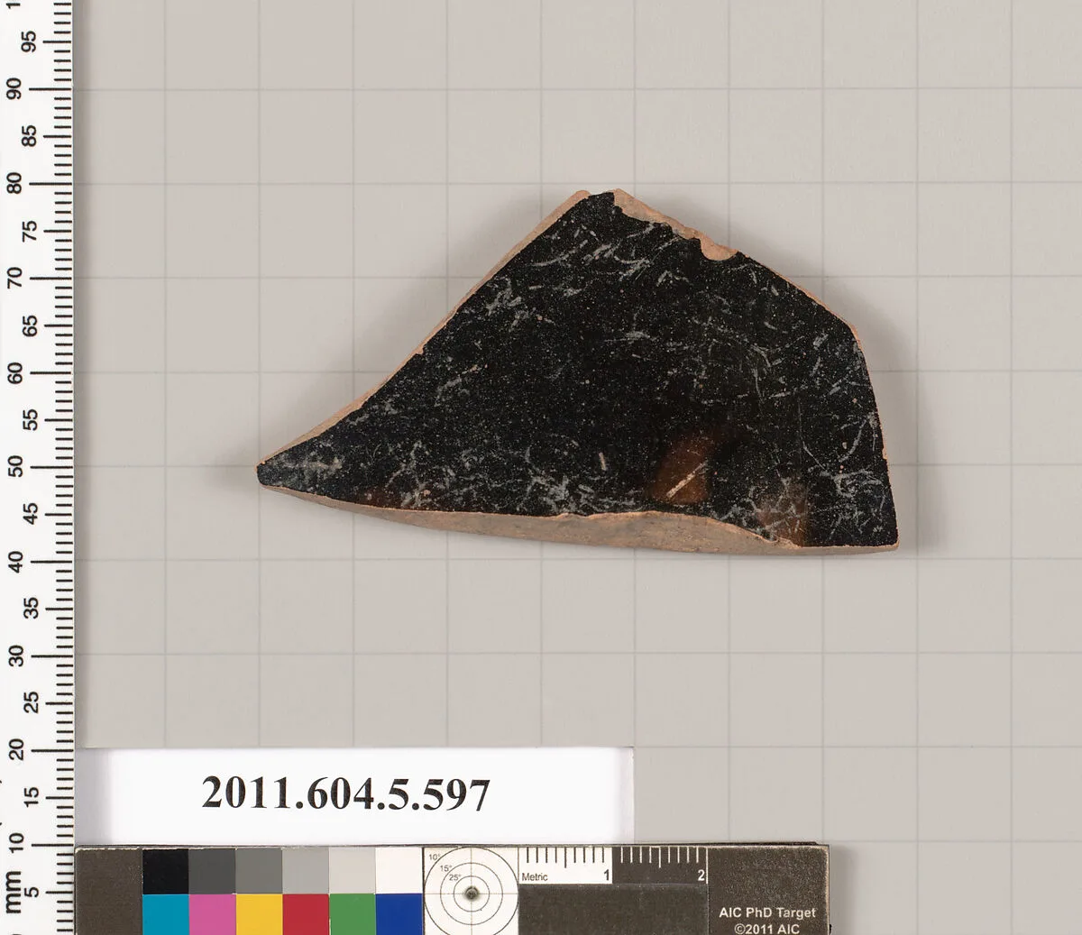 Terracotta fragment of a kylix (drinking cup)? — Unknown