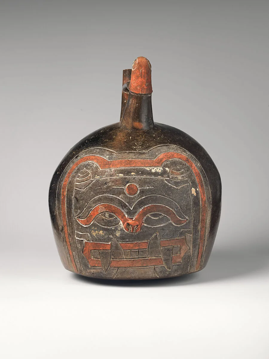 Spout-and-bridge bottle with feline face — Paracas artist(s)