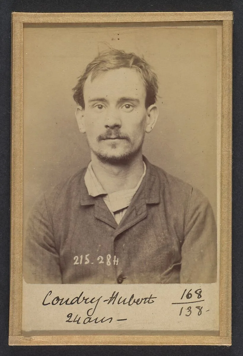Coudry. Hubert, Louis. 24 ans, né à Paris XVe. Corroyeur. Anarchiste. 7/3/94. — Alphonse Bertillon