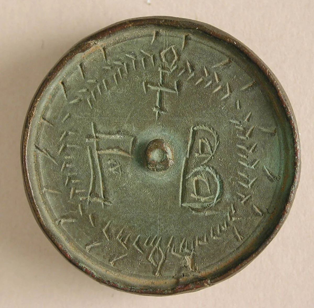 Three Round Copper-Alloy Balance Weights with Crosses — Unknown