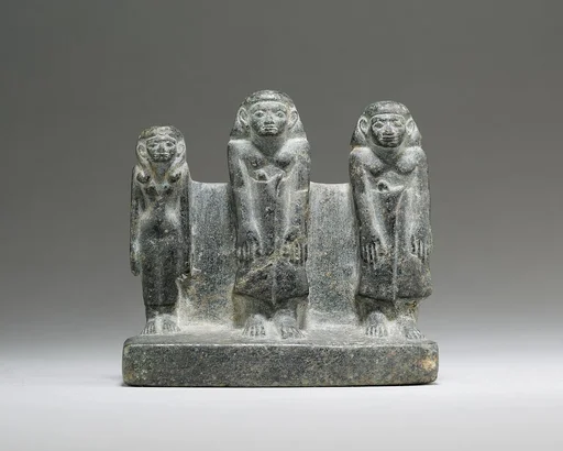 Group statuette of two men and a woman