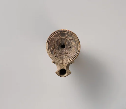 Terracotta oil lamp