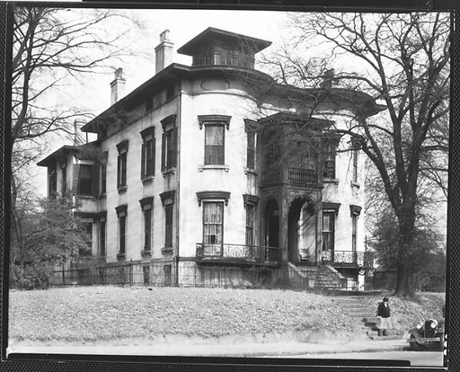 [Italianate Revival House with Two Story Entry Porch and Woman on Steps, Macon, Georgia]