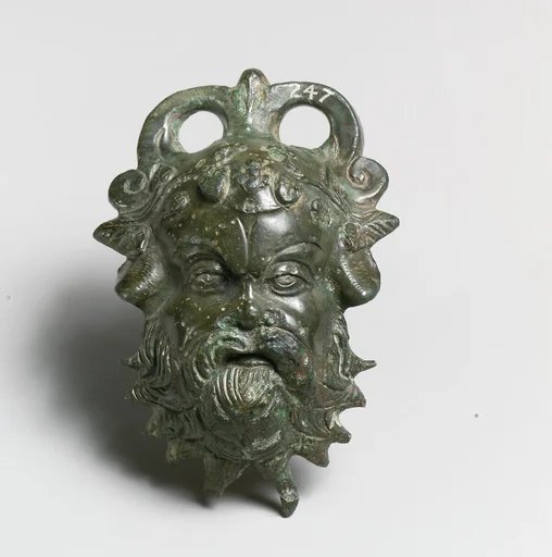 Bronze situla (pail) attachment in the form of a Silenos head