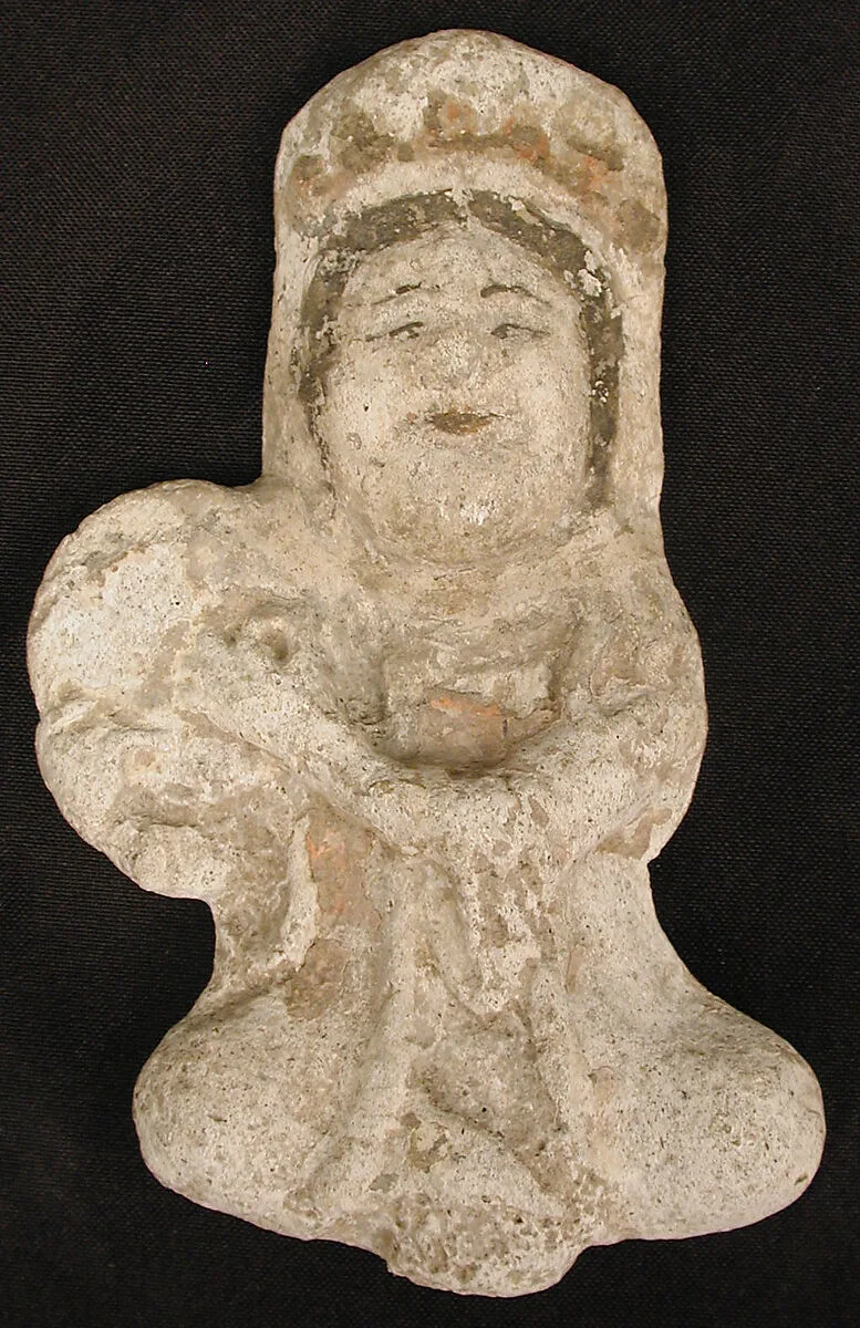 Seated tambourine player — Unknown