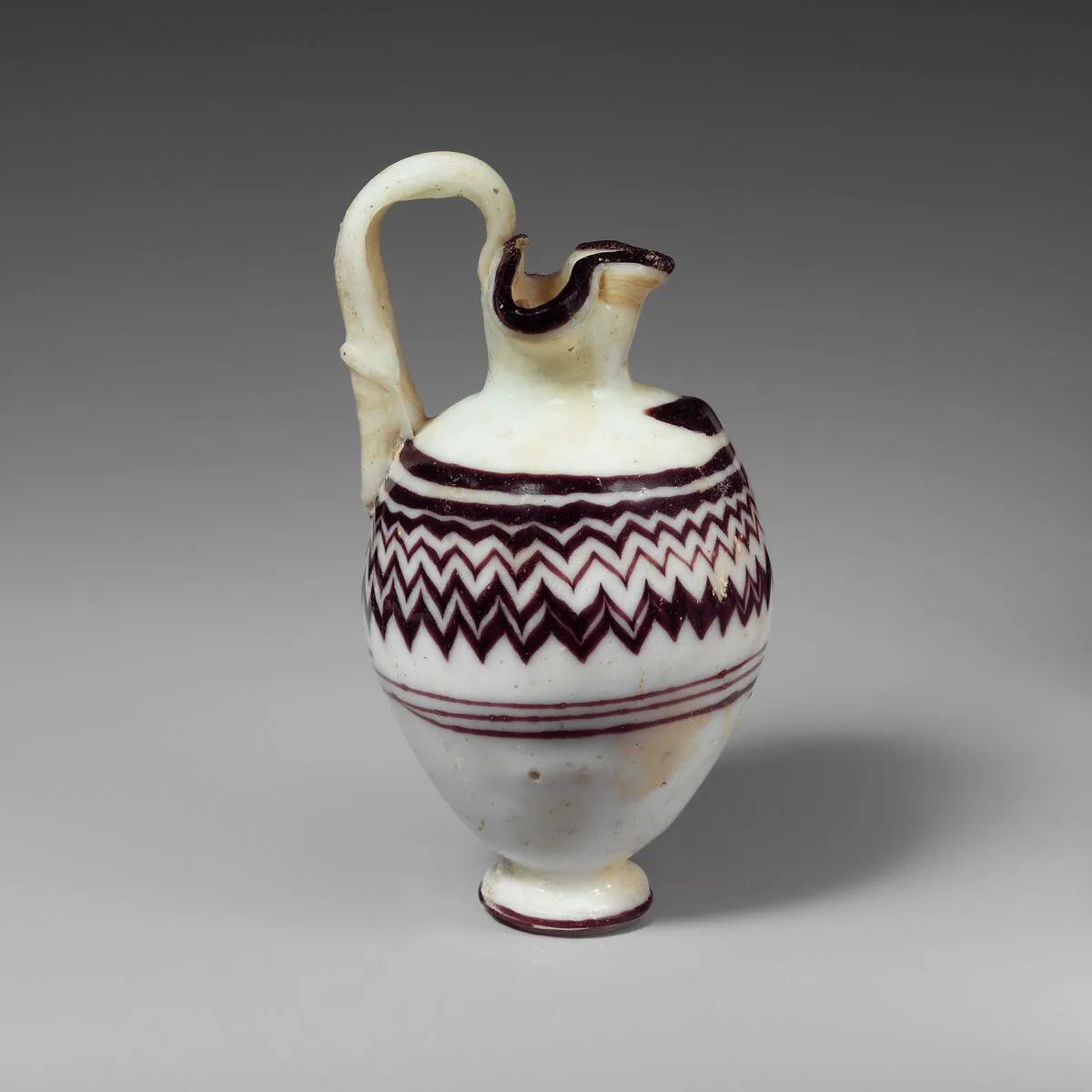 Glass oinochoe (perfume jug) — Unknown