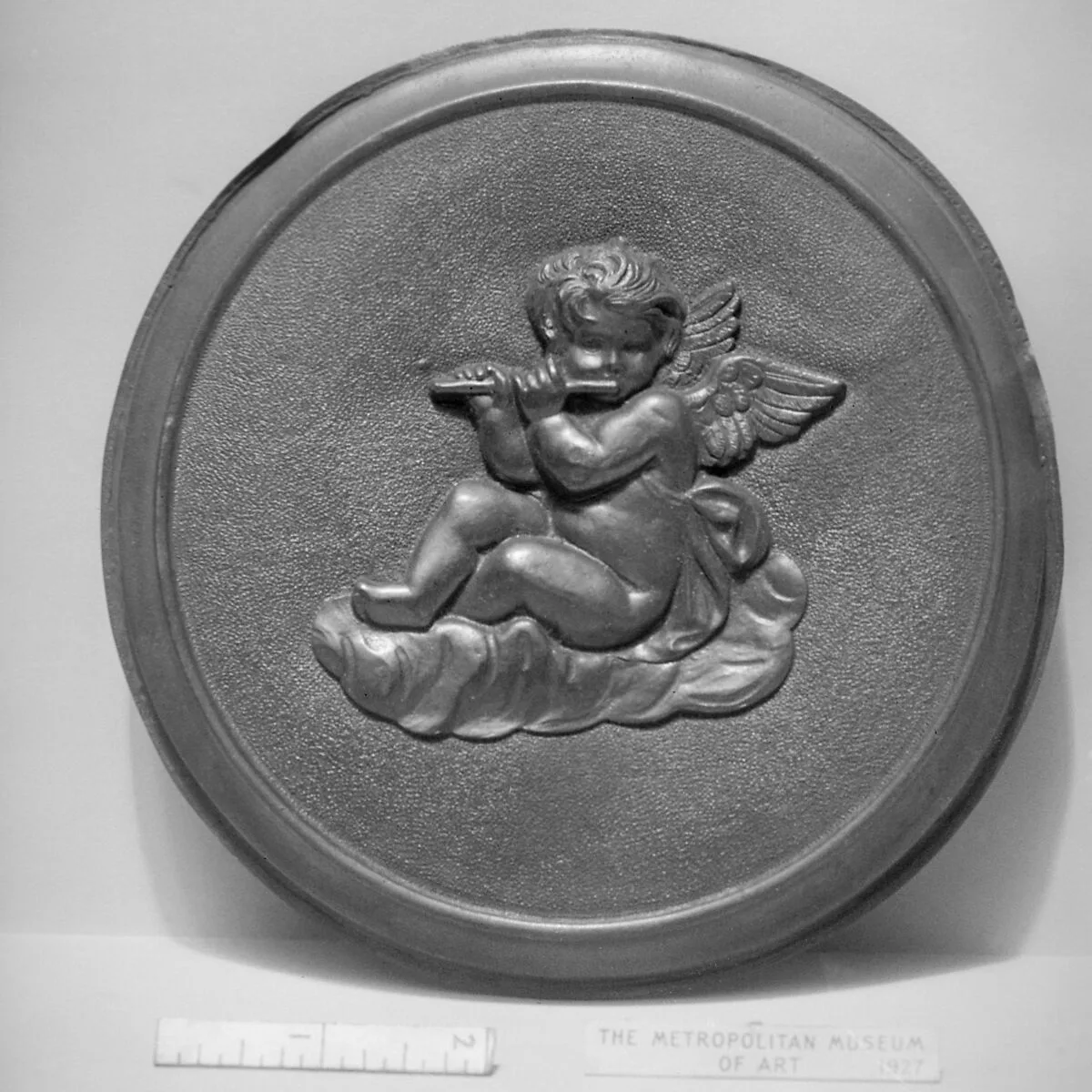 Cupid playing flute — Unknown