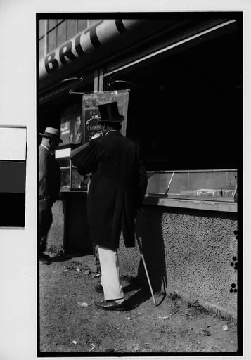 [Barker with Megaphone Outside Food Stand, New York City]
