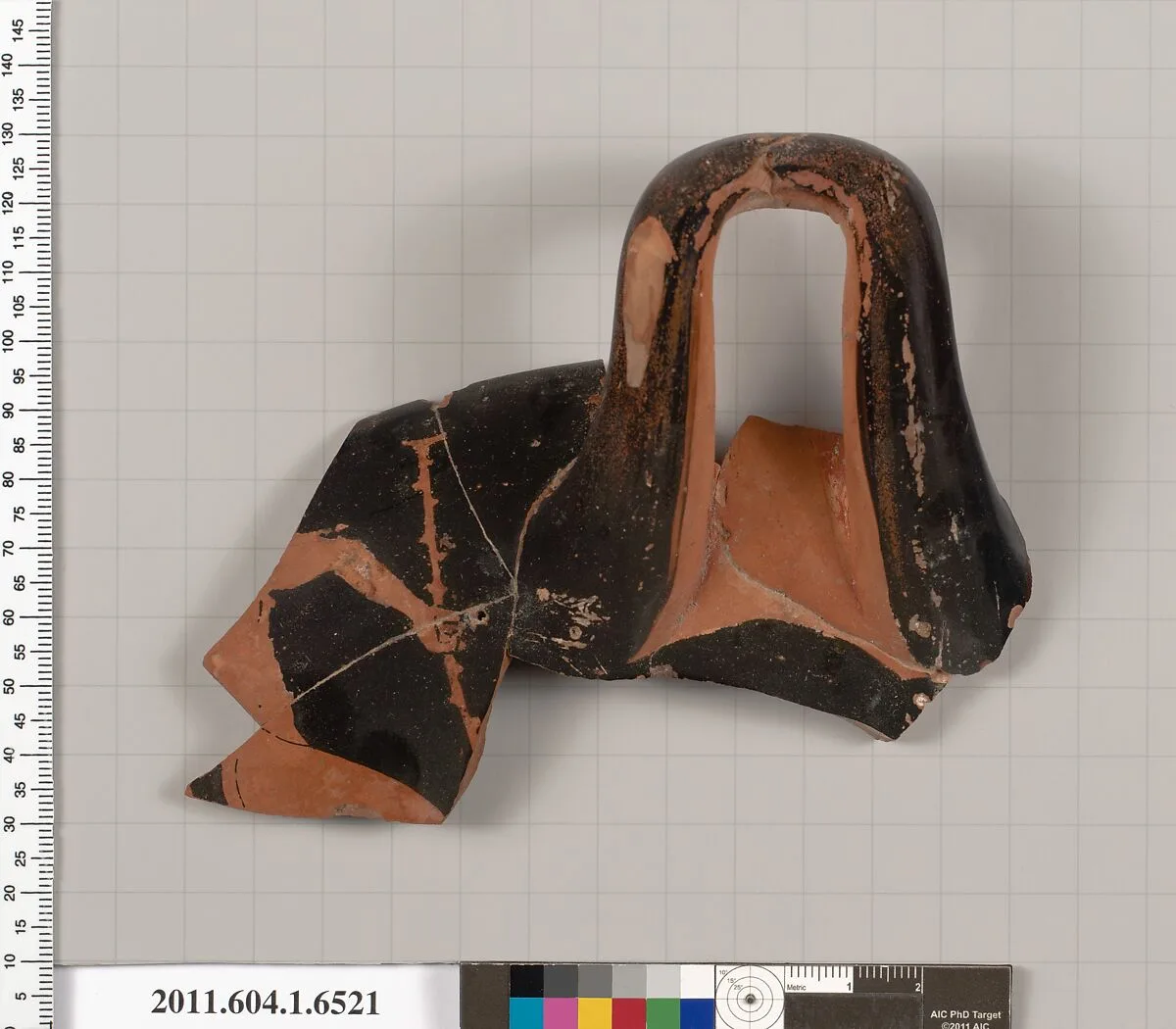 Terracotta rim fragment of a kylix (drinking cup) — Unknown