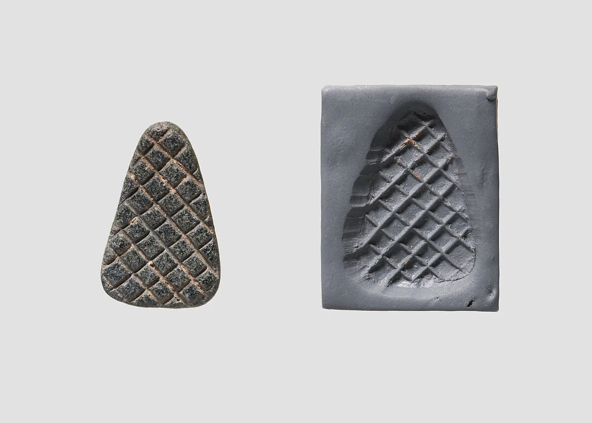 Loop-handled wedge shaped stamping device — Unknown