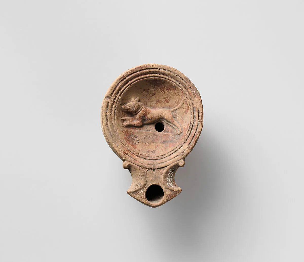 Terracotta oil lamp — Unknown