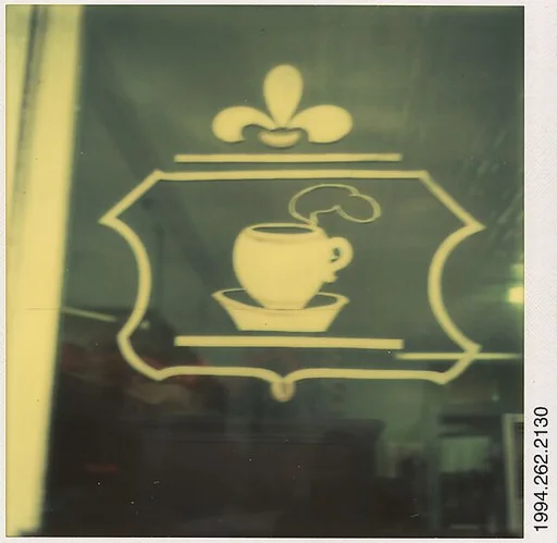 [Sign: Painted Coffee Cup on Window]