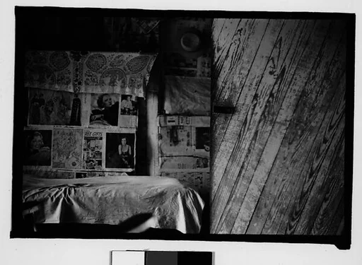 [Bedroom Interior with Newspaper-Covered Walls and Fireplace, Hale County?, Alabama]