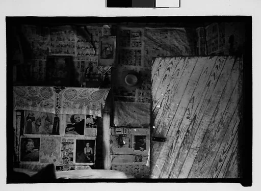 [Bedroom Interior with Newspaper-Covered Walls and Fireplace, Hale County?, Alabama]